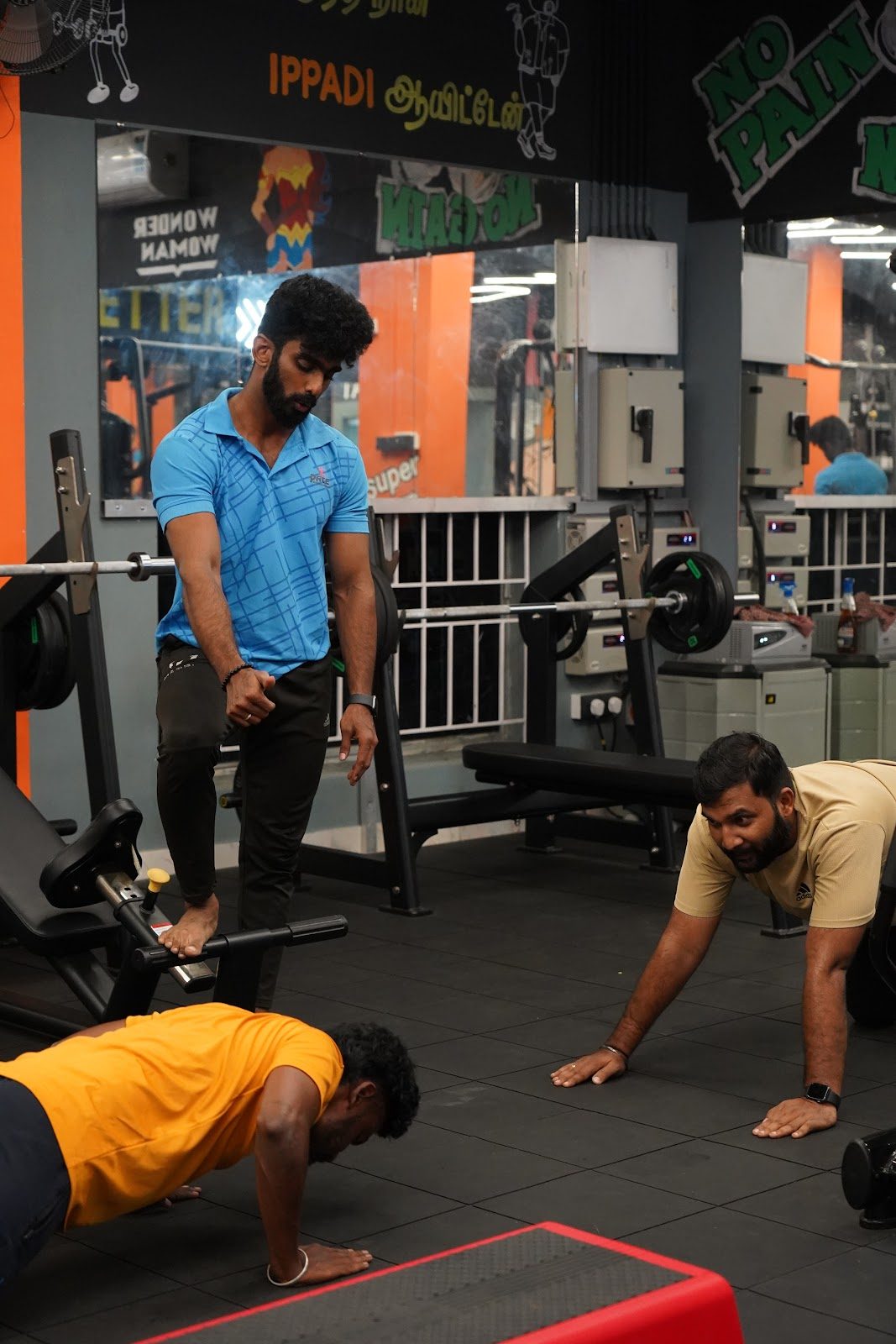 Trainer coaching floor exercises